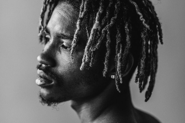 Black man posing in a studio