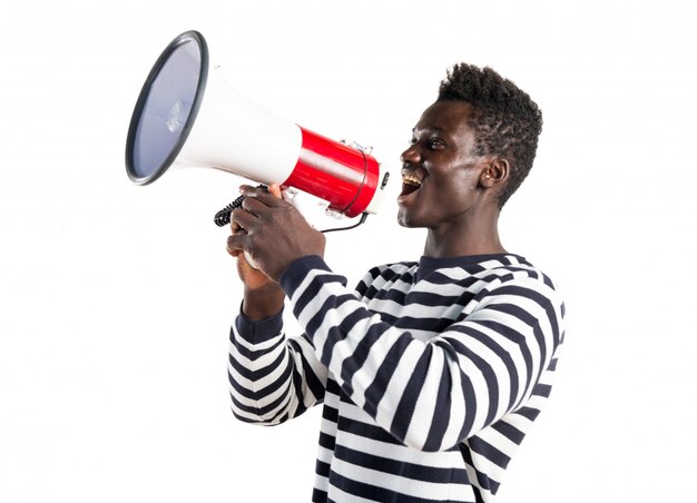 Black man shouting by megaphone