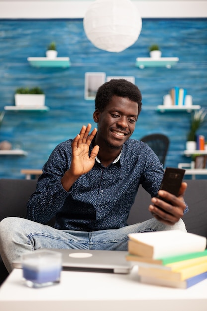 Black man talking on online video call conference