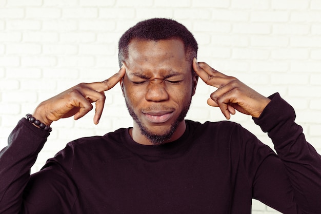 Photo black man tired