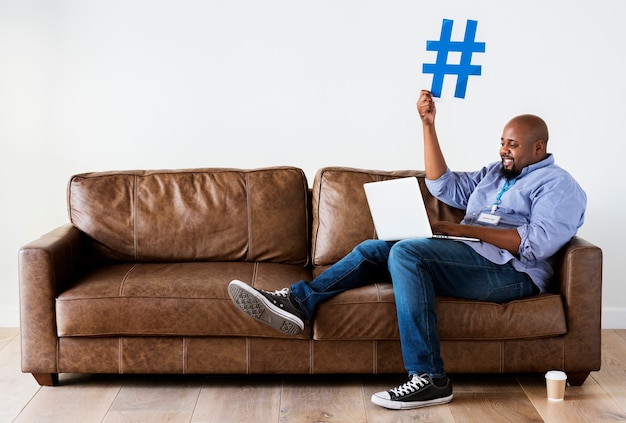 Black man working on laptop