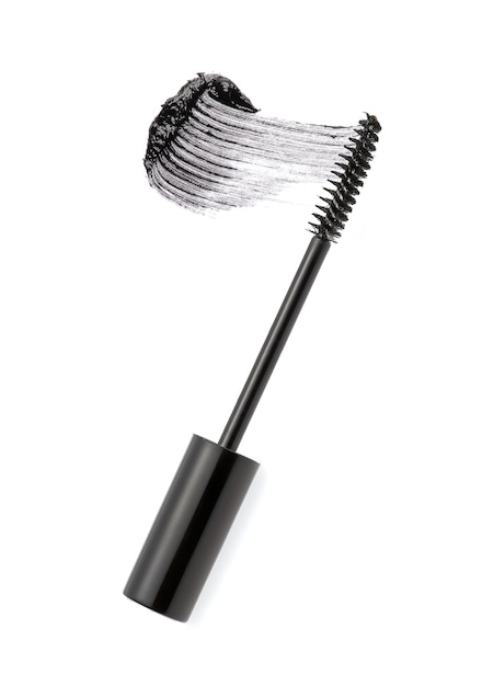 Black mascara brush stroke with applicator brush