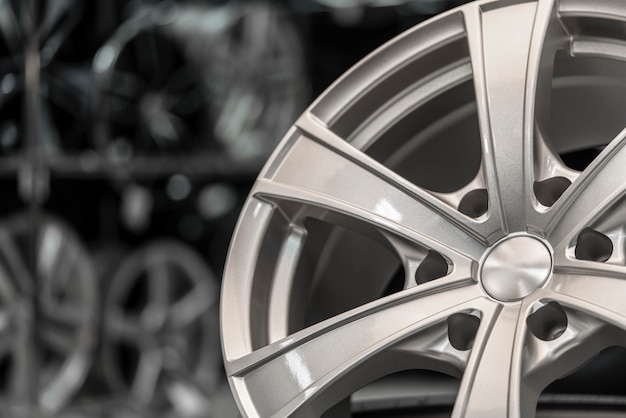 Black matte five-beam alloy wheel with a silver rim