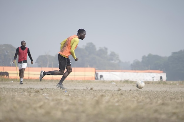 Photo black men playing football