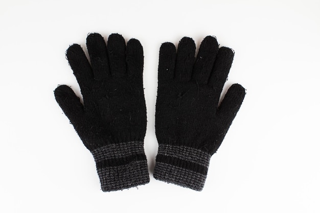 Photo black men39s winter gloves on a white background