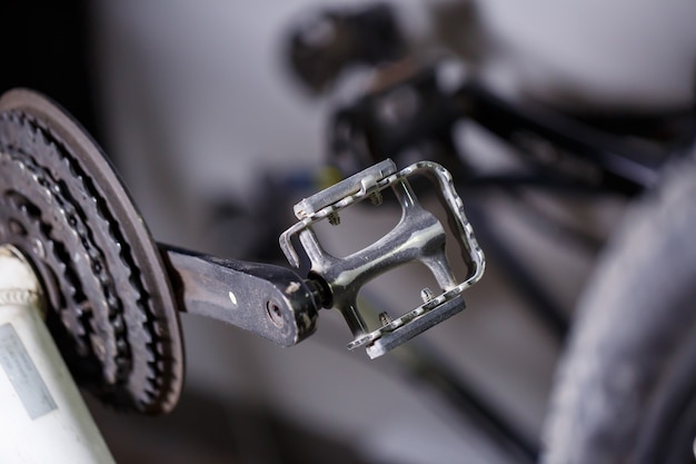 Black metal pedal on a bike with hard light. Bike accessories