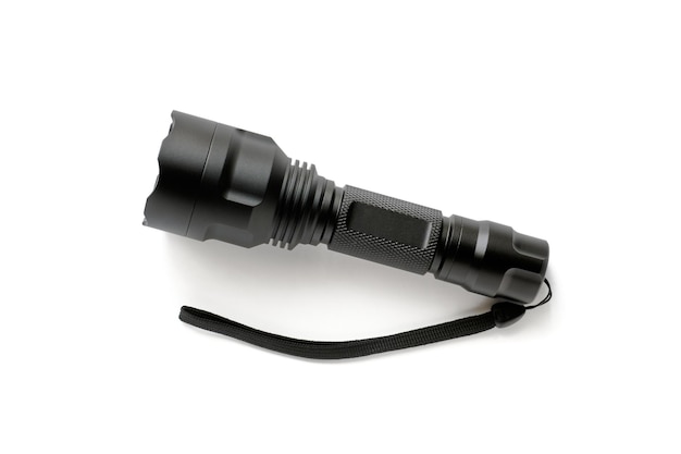 Black modern LED pocket flashlight made of aluminum, close-up