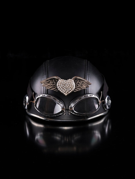 black motorcycle helmet on a black background