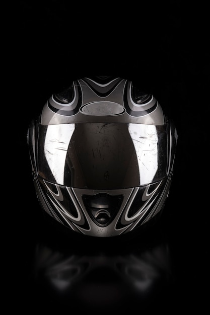 Photo black motorcycle helmet on a black background