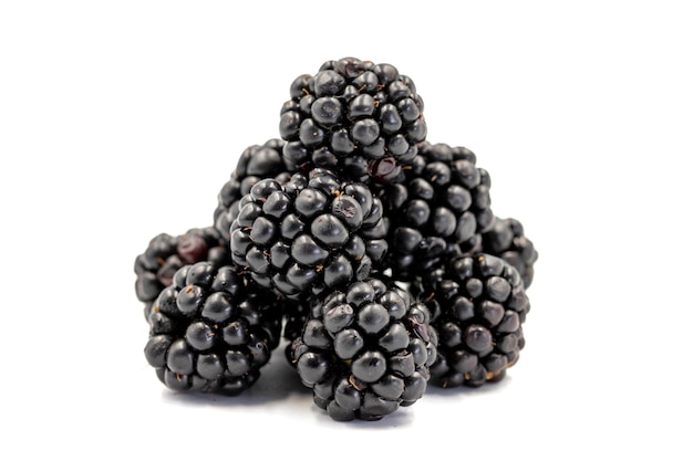 Black mulberry isolated on white background Fresh and juicy black mulberry Organic food close up