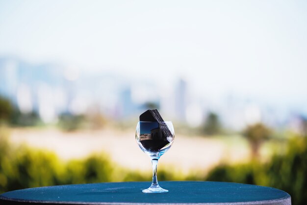 Black napkins in glass on table