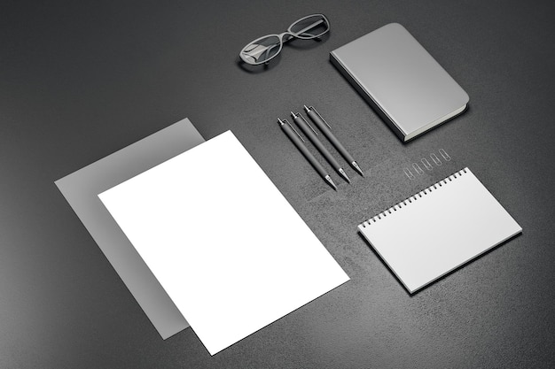 Black office table with empty devices and supplies