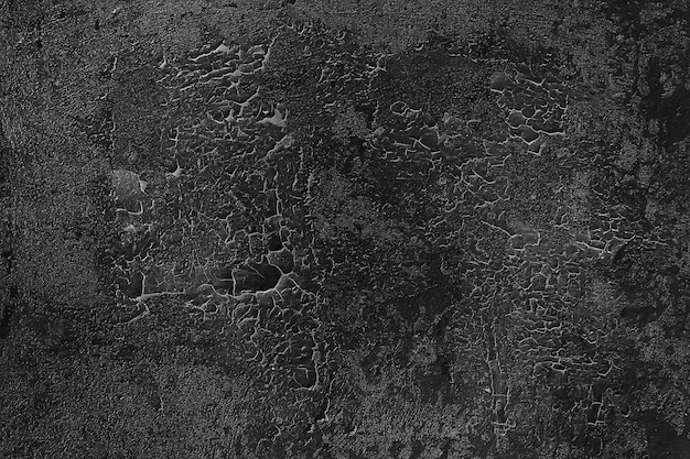 Photo black old wall cracked concrete background / abstract black texture, vintage old background