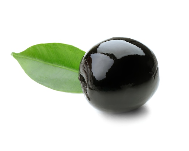 Black olive with green leaf isolated on white