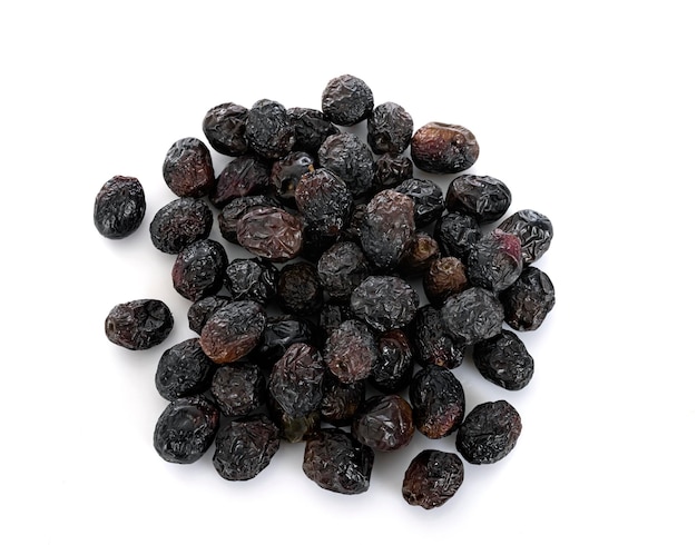 Black olives in front of white background