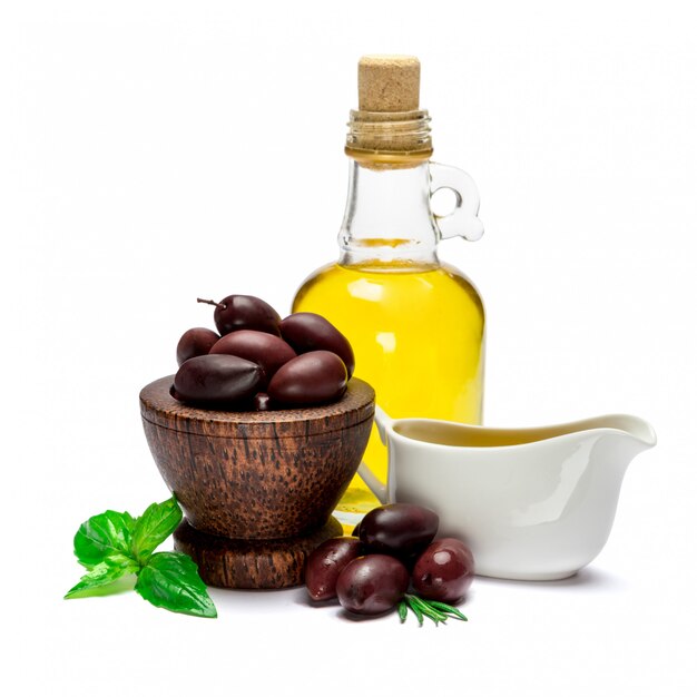 Black olives isolated in wooden bowl on white surface