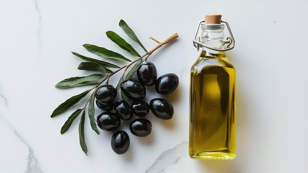 Black olives with twig and oil bottle on the white marble backdrop