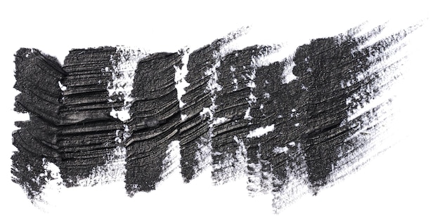 Foto tratto di vernice nera con campione di pennello a setole isolato su sfondo bianco