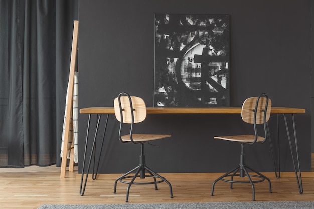 Black painting on dining table