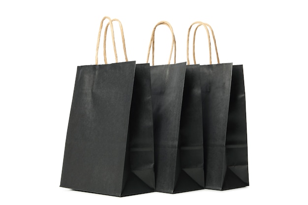 Black paper bags isolated on white 