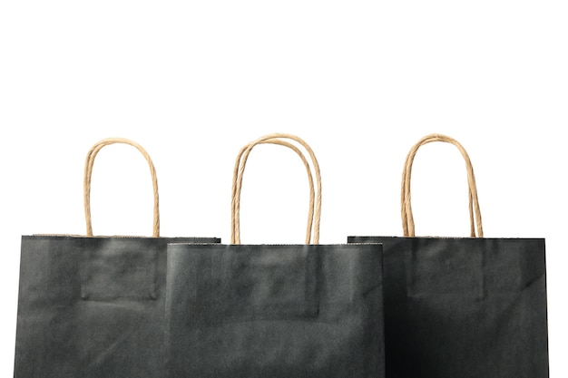 Black paper bags isolated on white 