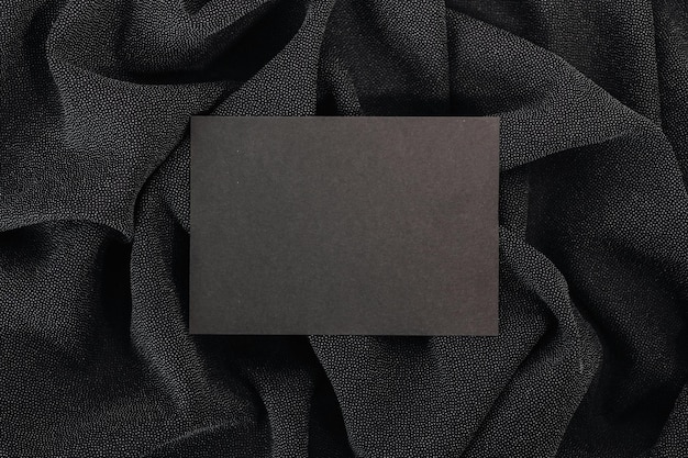 Photo black paper on a fabric stock photo