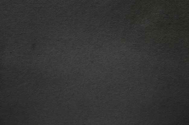 Photo black paper surface with grainy texture