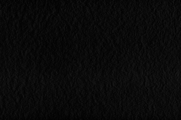 Black paper texture background.