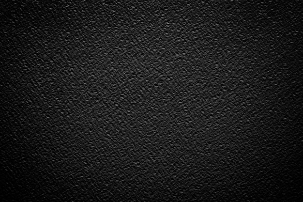 Black paper texture background.