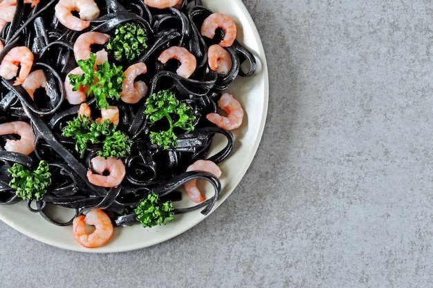 Black pasta with shrimps.