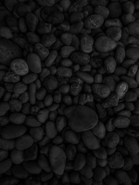 Black pebble stones texture 