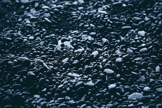 Black pebbles background