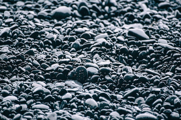 Black pebbles background