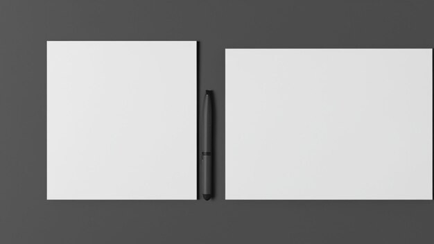 A black pen is next to a white notebook.