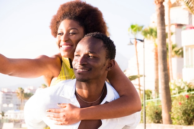 Black people young couple have fun and laugh enjoying the
outdoor leisure activity together