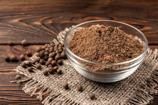 Black pepper on a glass bowl on the table