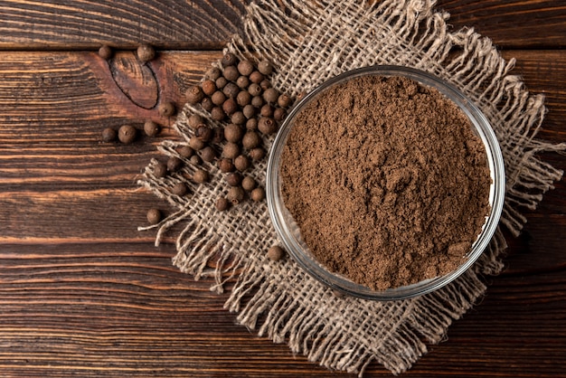 Black pepper on a glass bowl on the table