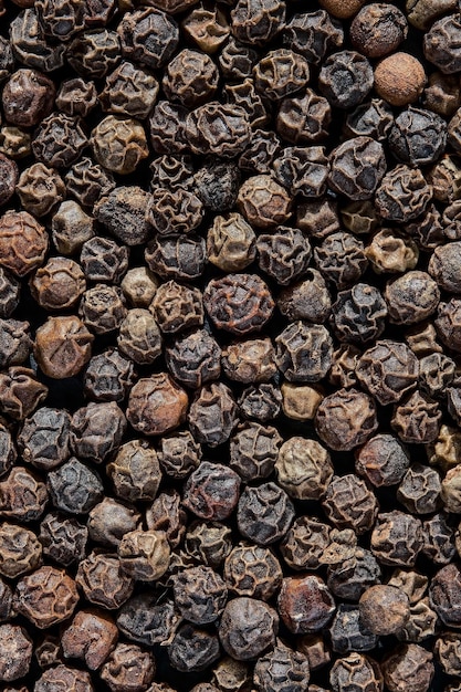 Black pepper vertical frame flat lay or mockup Aromatic spices screen wallpaper ideas