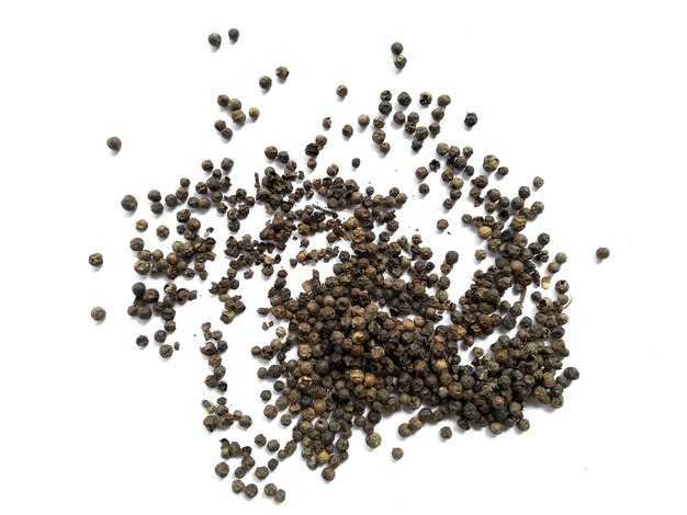 Black pepper on white background