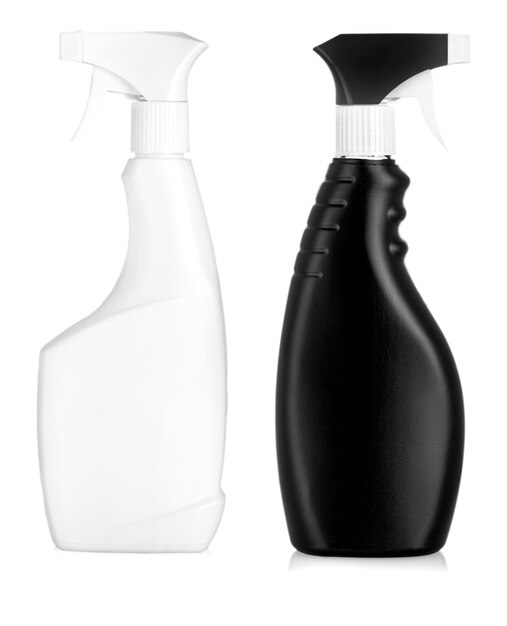 Black plastic bottles of cleaning products and flower. Isolated on white background