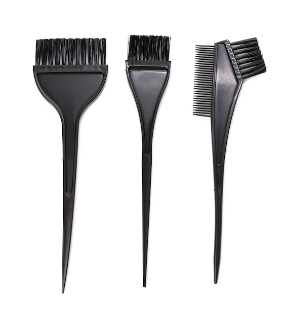 Black plastic brush for hair coloring isolated on white background, close up, set