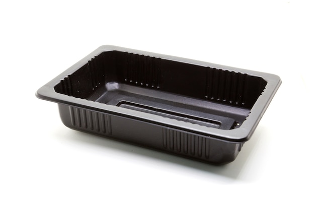 Photo black plastic food container on white background