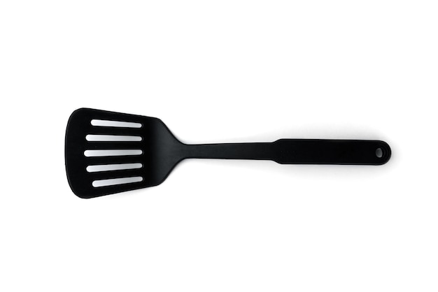 Photo black plastic kitchen spatula isolated on white background