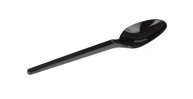 Black plastic spoon isolated on white background.