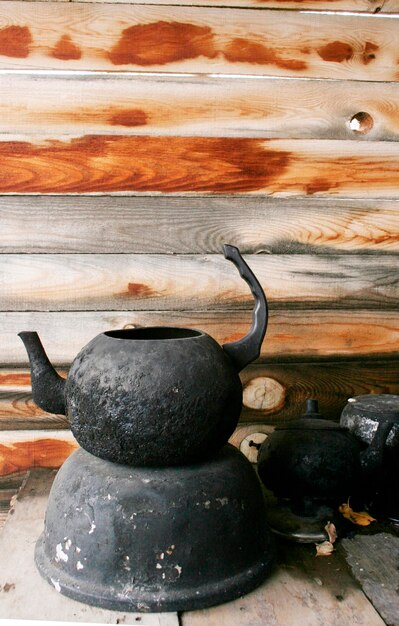 Black pot and teapot in the shed