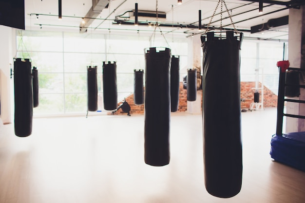 Black Punching bag for boxing or kick boxing sport.