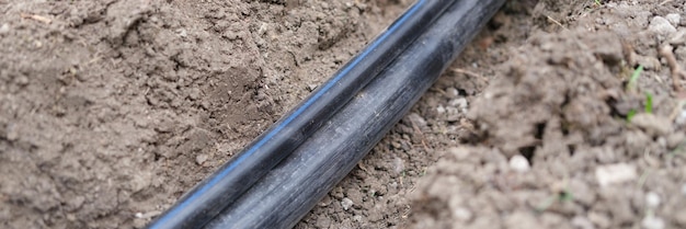 Black pvc sewer pipe optical fiber communication and\
communication infrastructure concept of