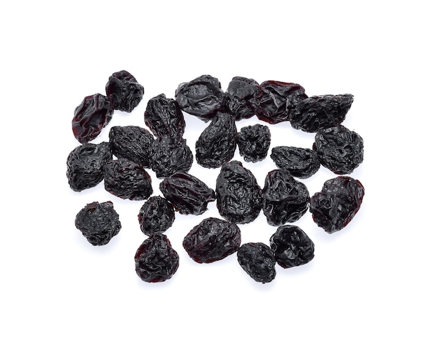 Black raisin isolated on white