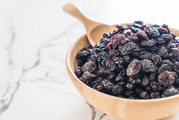 black raisins in bowl