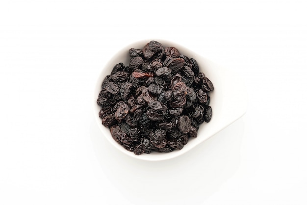 black raisins on white